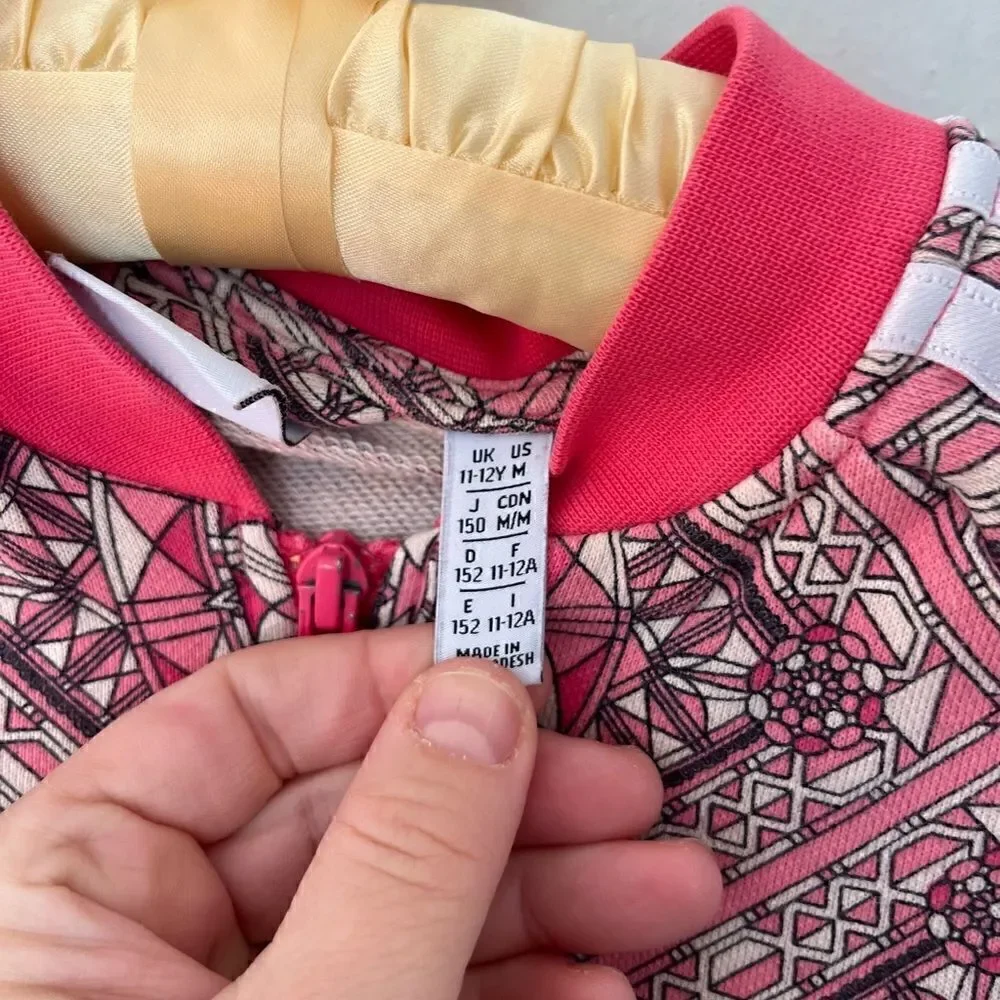Adidas | pink busy patterned zip up jacket girls
